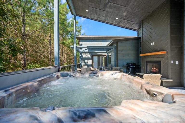 Luxury hot tub on private covered patio, ideal for a couple's getaway