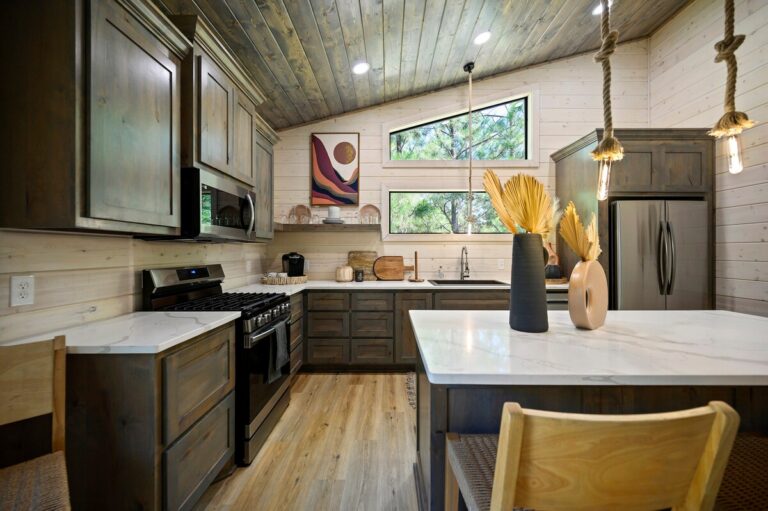 Modern rustic kitchen with wood cabinetry and island, ideal for a couple's getaway