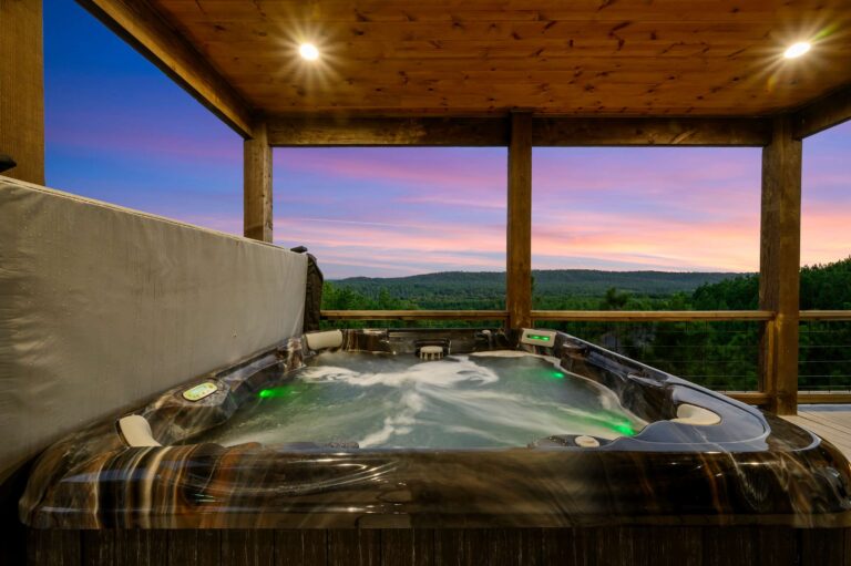 Hot tub with sunset mountain views—ideal for a large family vacation retreat