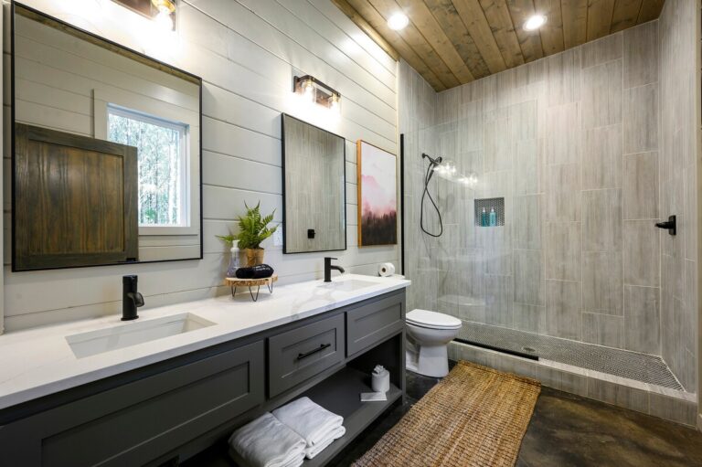 Bathroom with double vanity and large walk-in shower