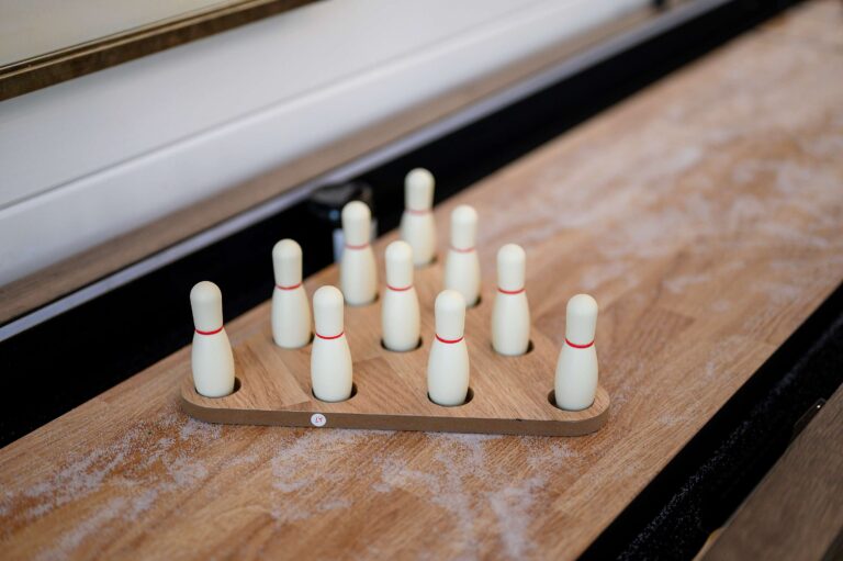 Shuffleboard bowling game setup—perfect indoor fun for a large family vacation