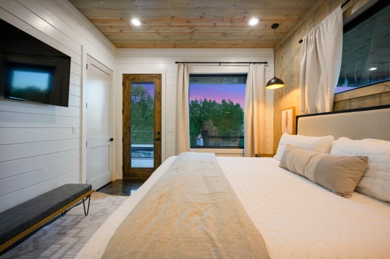Bright and cozy bedroom with nature views, perfect for a large family vacation