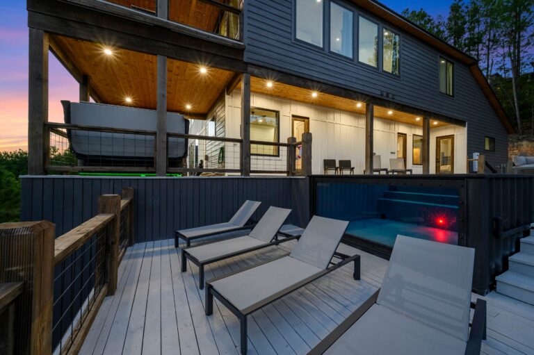 Private pool with lounge deck at luxury cabin for large family vacation