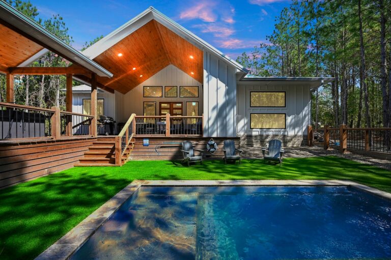 Splish Splash cabin backyard with pool for family vacation ideas to experience nature and enjoy nearby river activities.