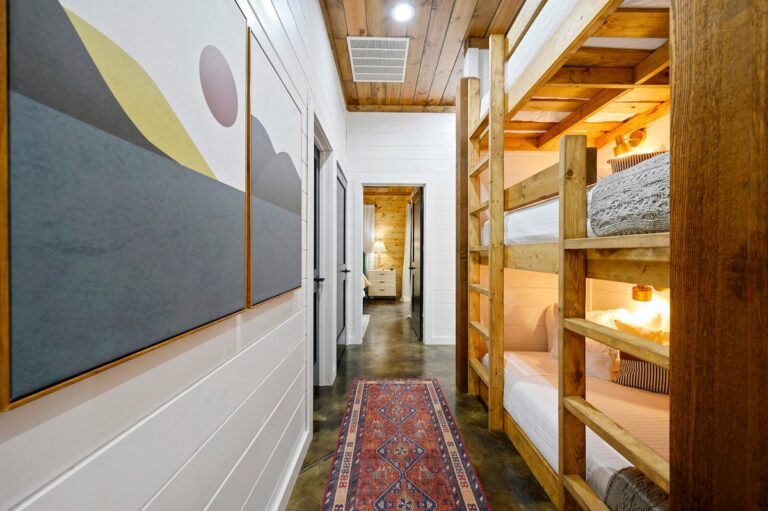 Splish Splash hallway with bunk beds for family vacation ideas, kids resting after river activities, and ways to experience nature together.