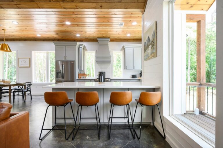 Splish Splash cabin kitchen island with bar seating for family vacation ideas, river activities, and ways to experience nature together.