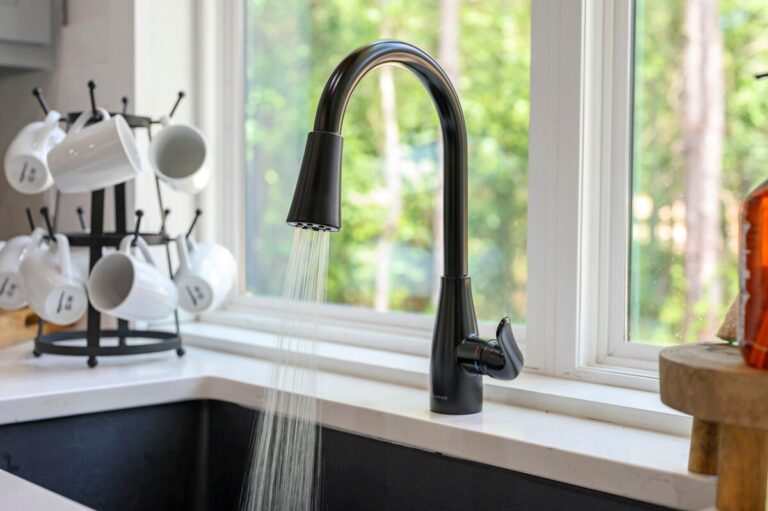 Splish Splash cabin kitchen sink ready for family vacation ideas, a cozy spot to experience nature after river activities.