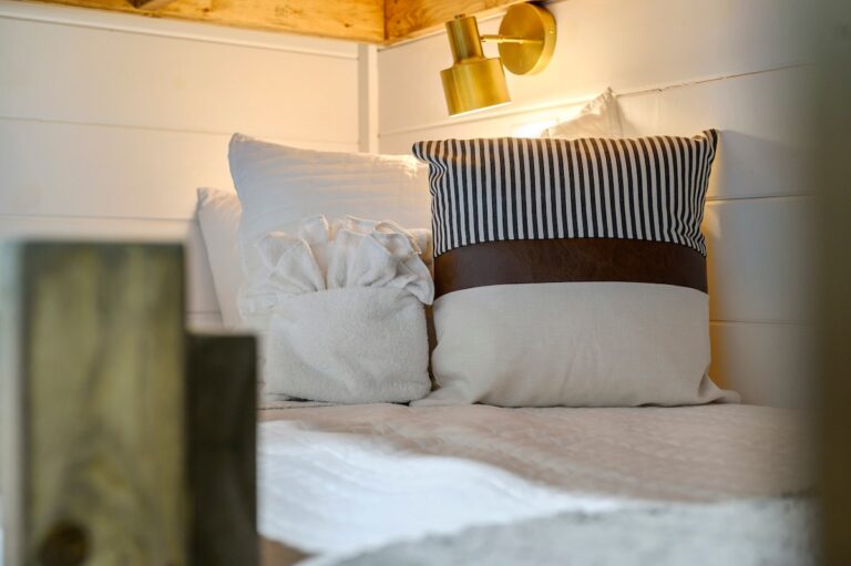 Splish Splash bunk bed detail with pillow and towel, designed for family vacation ideas, kids resting after river activities, and cozy ways to experience nature.