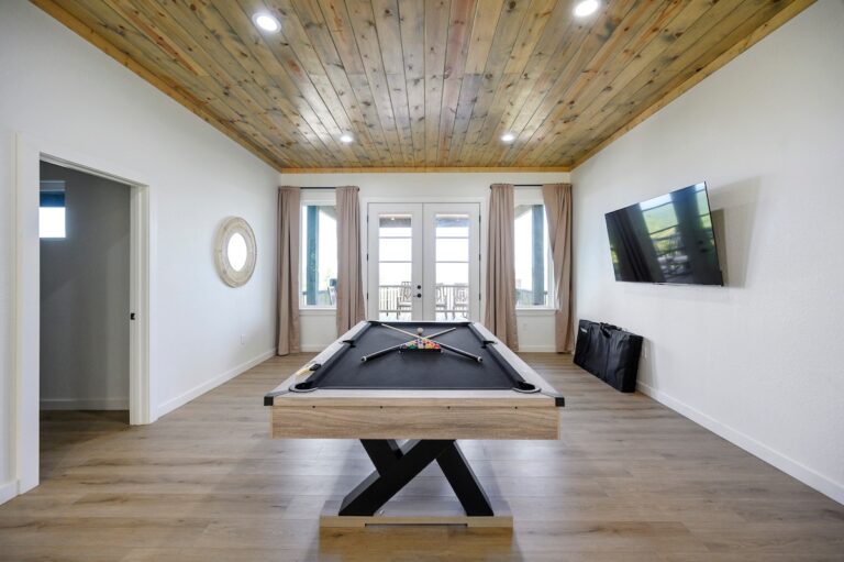 Game room with pool table in a pet friendly cabin near stargazing spots and outdoor fire pit