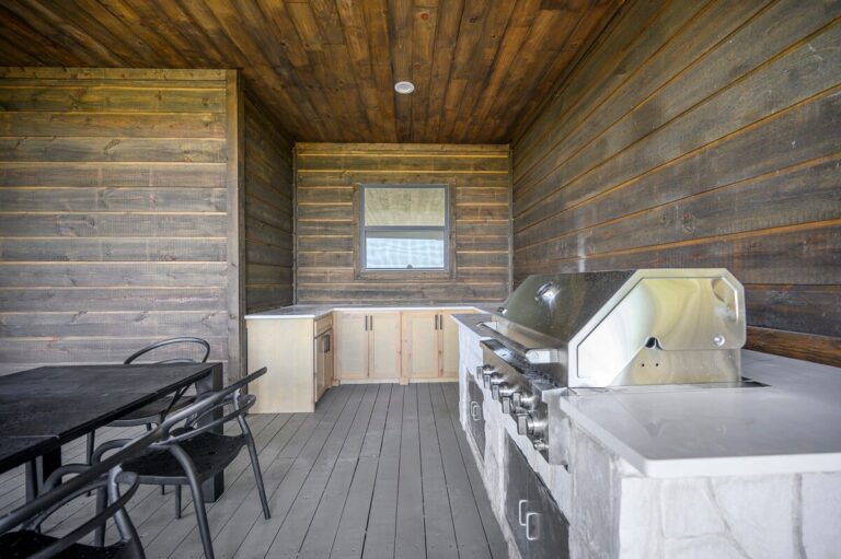 Outdoor kitchen with grill for stargazing nights at Sky Dive Cabin