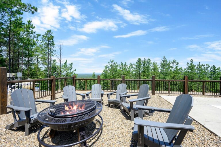 Outdoor fire pit with seating at a pet friendly cabin designed for stargazing nights