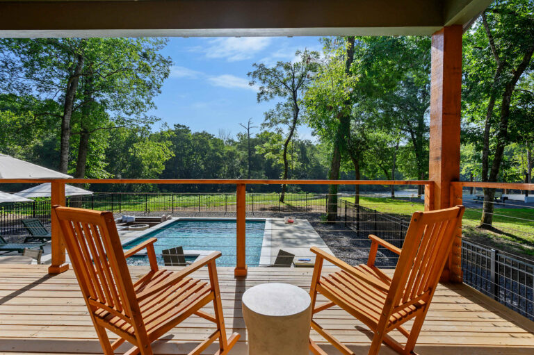 Broken bow luxury cabin rental with private pool and outdoor lounge area.
